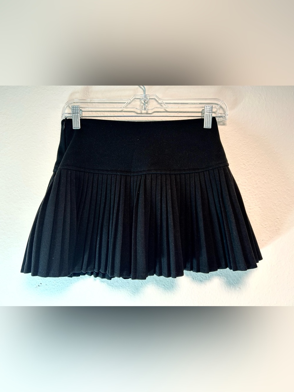 Black pleated mini skort